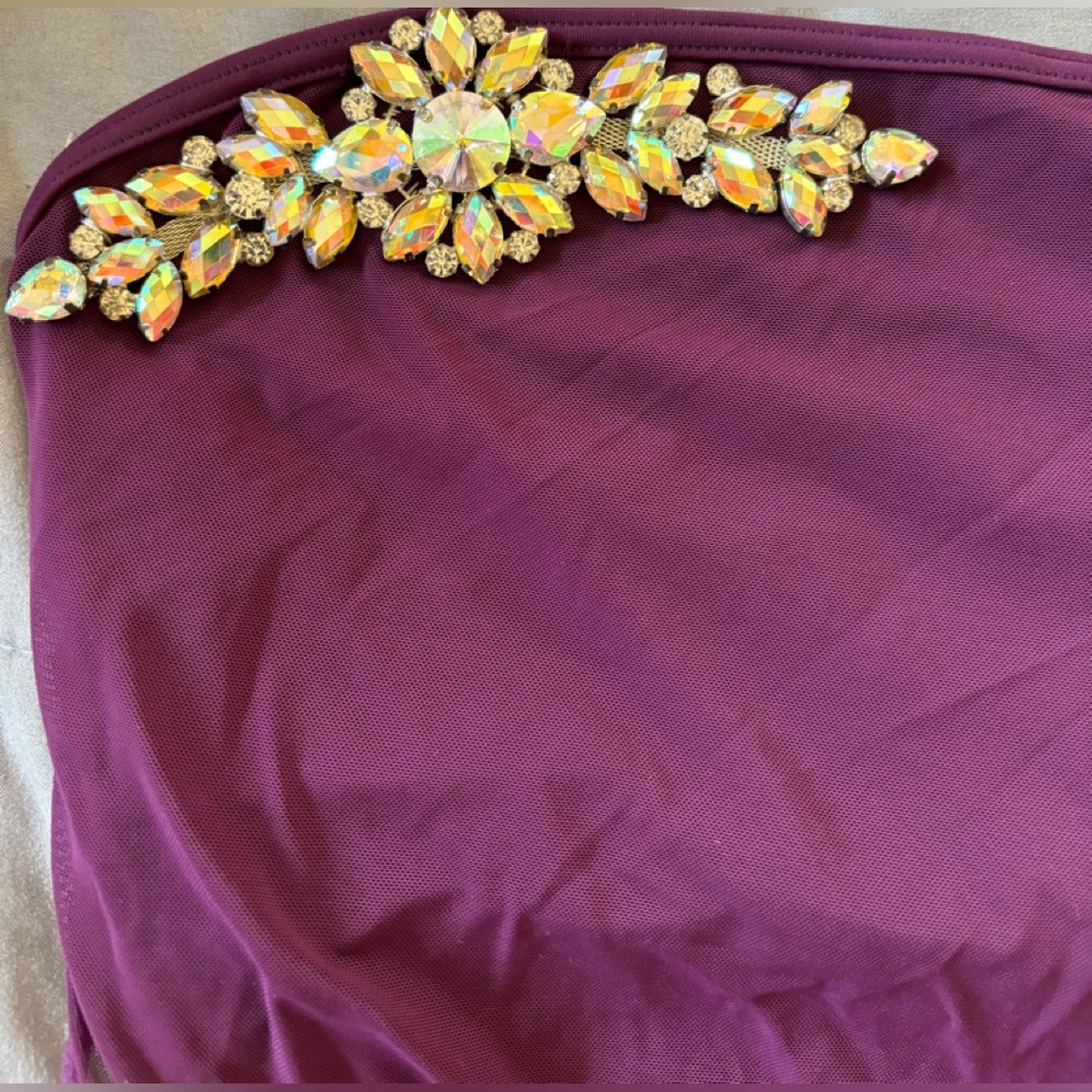 Custom rhinestones and appliqué dance costume.